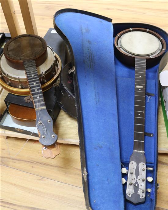A Banjo, three banjolele and one ukulele